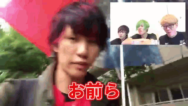 a man in a red shirt with chinese writing on his face