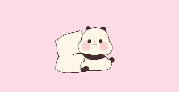 a panda bear is sitting next to a pillow and smiling .