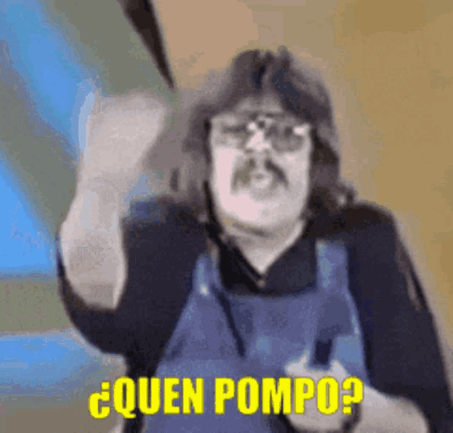 a man with glasses and a mustache is holding a knife and asking " quen pompo "