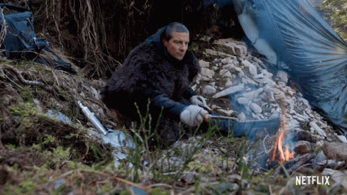 Cooking Bear Grylls GIF - Cooking Bear Grylls You Vs Wild Out Cold GIFs
