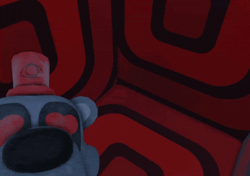 a red wall with black lines and a blue object