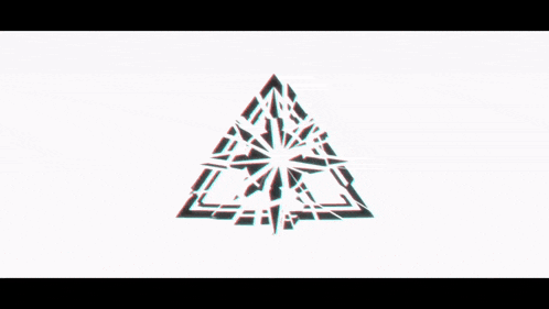 a white triangle with a red circle in the middle is glowing in the dark