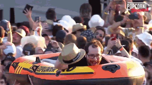 a man is in a raft that says explorer