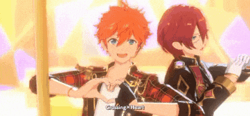 a couple of anime characters making a heart shape with their hands