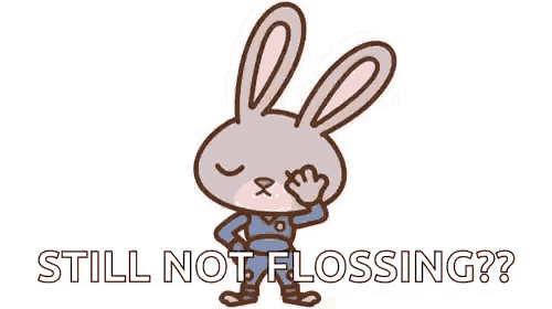 a cartoon rabbit is standing with its eyes closed and the words `` still not flossing '' .