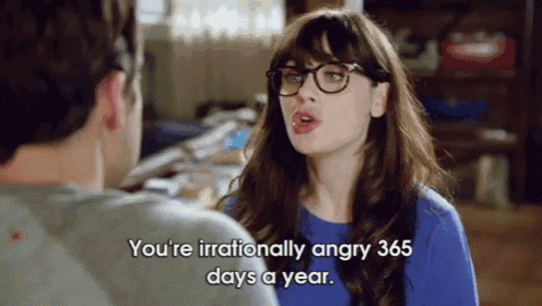 a woman wearing glasses is talking to a man and says you 're irrationally angry 365 days a year
