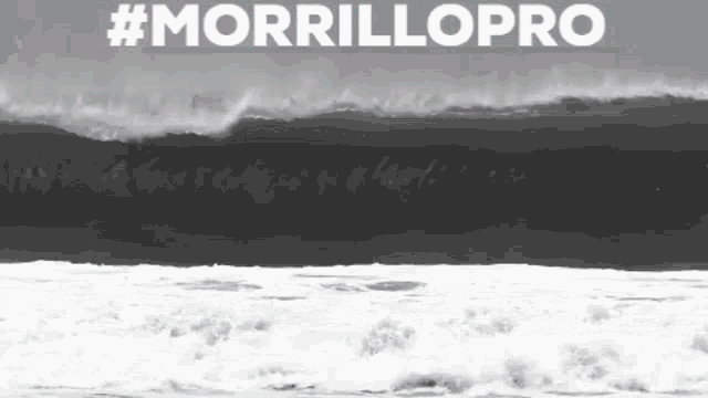 a black and white photo of a wave in the ocean with the hashtag #morrillopro