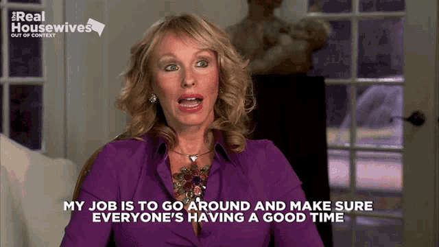 a woman says her job is to go around and make sure everyone is having a good time