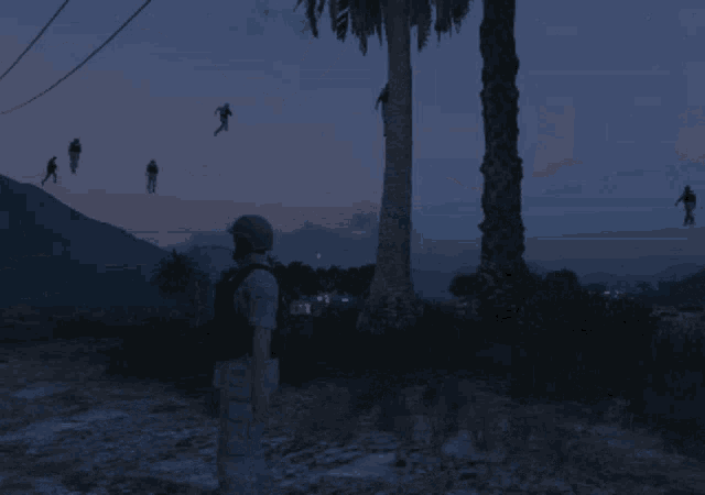 a man in a video game is standing in front of a palm tree with a bunch of people flying overhead