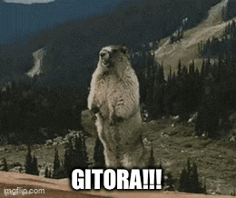 a groundhog standing on its hind legs with the word gitora written on the bottom