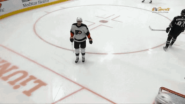 a hockey player with the number 34 on his back