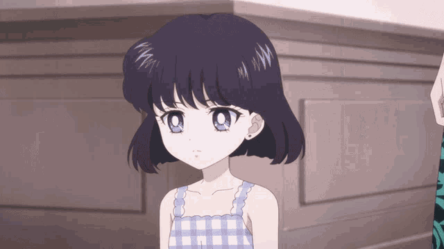 a little girl with purple hair and blue eyes