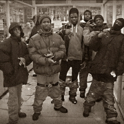 a group of people are posing for a picture in a black and white photo
