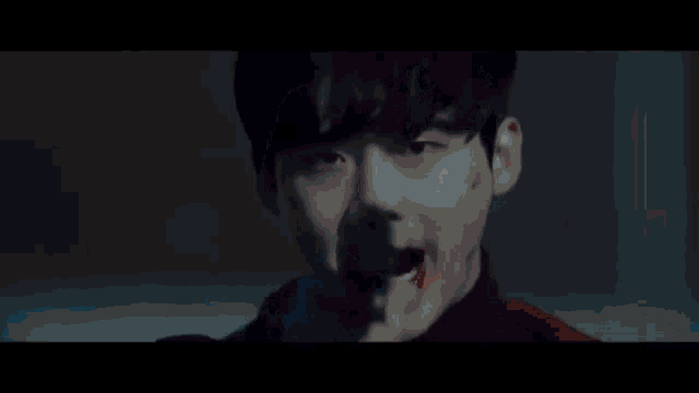a blurred image of a person 's face with a circle in the middle