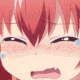 a close up of a girl with red hair crying with tears running down her face .