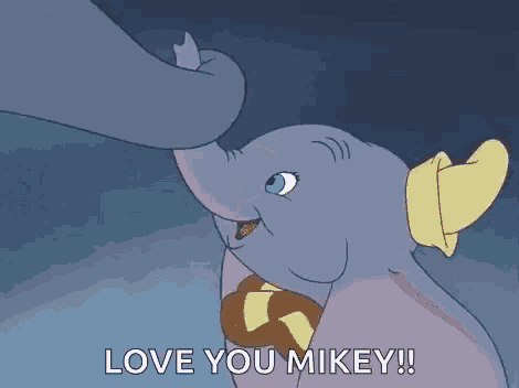dumbo from the disney movie dumbo is hugging a baby elephant and saying `` love you mikey ! ''