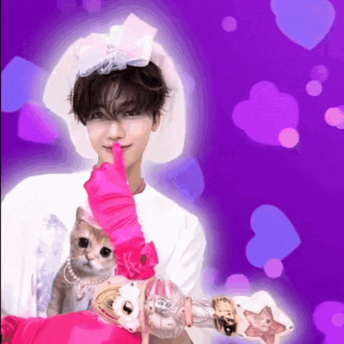 a man is holding a cat in a pink costume