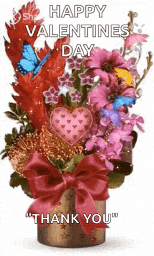 a bouquet of flowers in a vase with a bow and the words `` happy valentine 's day thank you ''