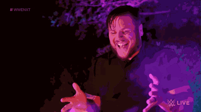 a purple background with the letters w live on the bottom left