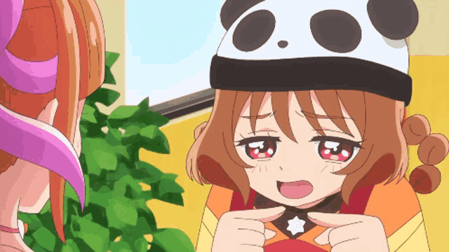 a cartoon girl wearing a panda hat making a funny face