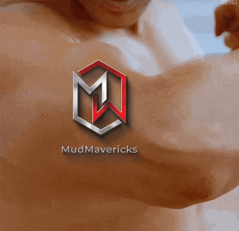 a shirtless man is flexing his muscles with a logo for mudmavericks on his arm