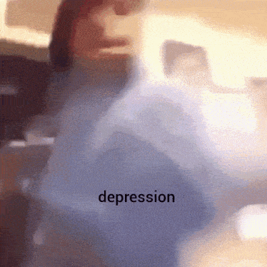 a blurry picture of a person with the word depression written on the bottom