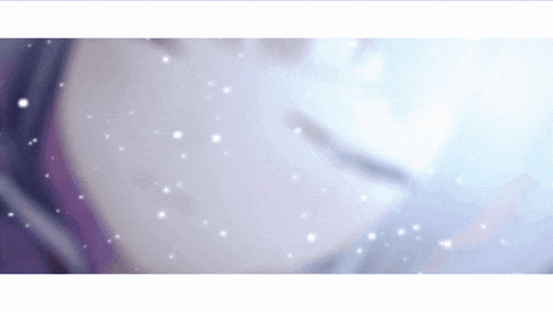a close up of a person 's face with snow falling on it