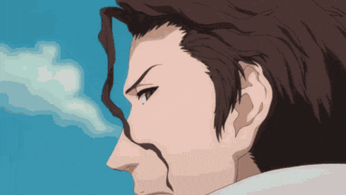 a close up of a man 's face against a blue sky