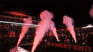 red smoke coming out of a scarlet knit sign