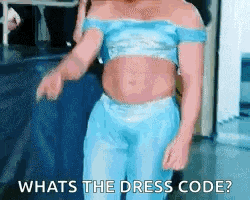 a man in a blue dress is dancing and asking what 's the dress code .