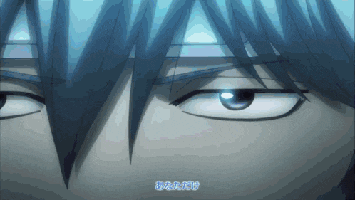 a close up of a person 's eyes with a foreign language written below them