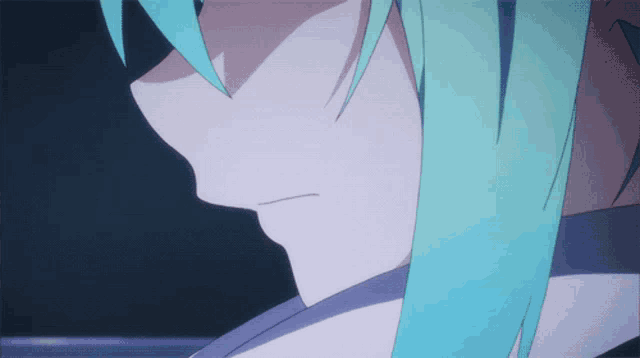 a close up of a person with long blue hair