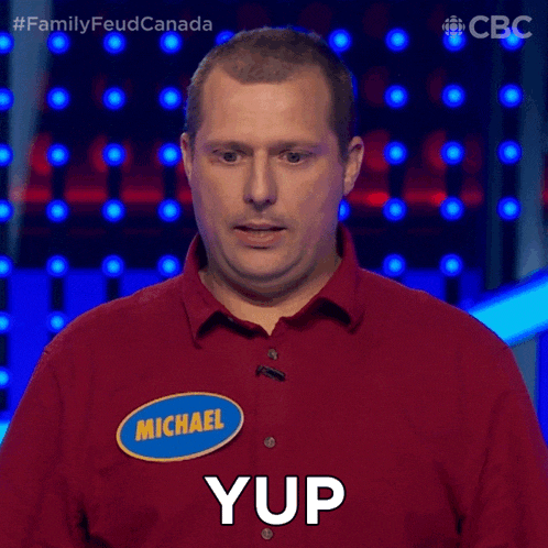 a man with a name tag that says michael yup on it