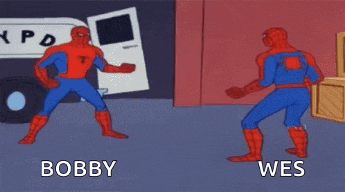 a cartoon of two spider-man standing next to each other in front of a van .