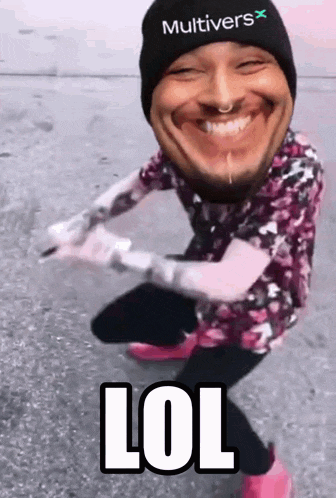 a man wearing a beanie and a floral shirt is making a funny face and says lol .