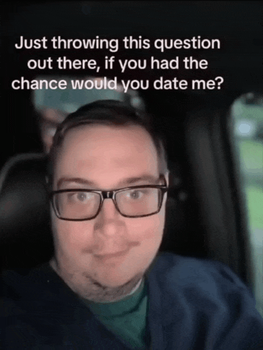 a man wearing glasses is sitting in a car with a caption that says just throwing this question out there