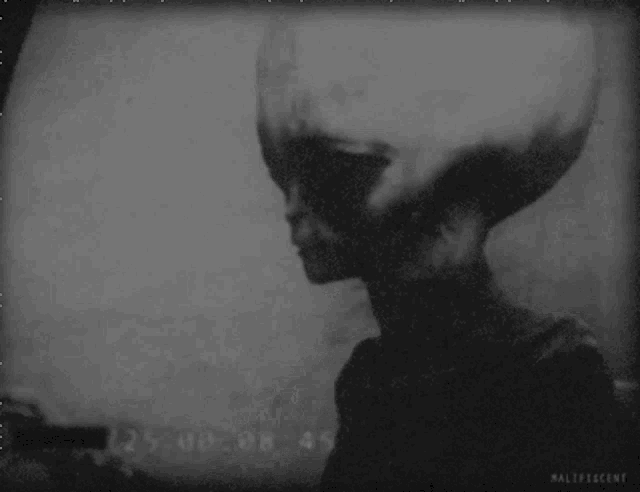 a black and white image of a person with the time of 25 08 08 45