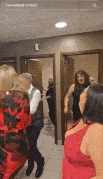a group of women are standing in a hallway with a search bar that says find related content at the top