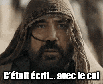 a man with a beard is wearing a scarf around his head and says c ' était écrit avec le cul