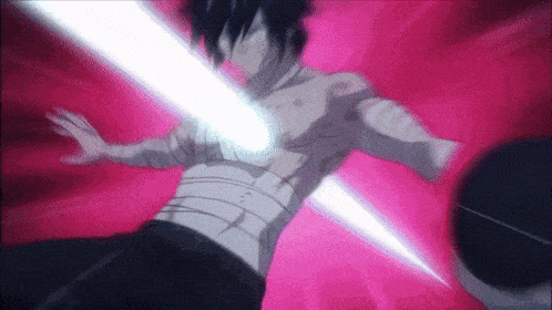 a man without a shirt is being hit by a light