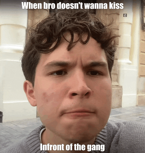 a man making a face with the caption when bro does n't wanna kiss in front of the gang