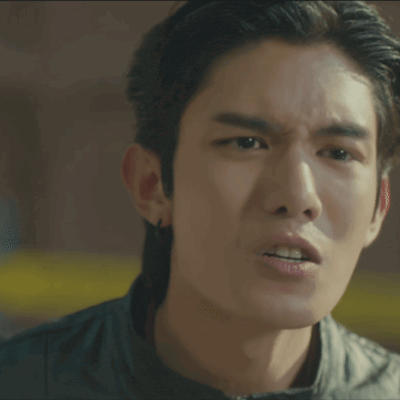 a close up of a man with his mouth wide open