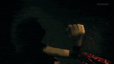 a video game screen shows a person 's arm with blood coming out of it and the word konami on the bottom