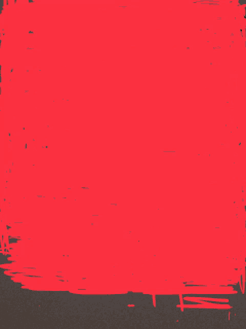 a red background with a black border and a few dots