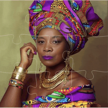 a woman wearing a purple head scarf and gold jewelry