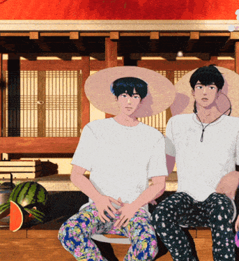 a man wearing a straw hat sits next to another man wearing a white shirt