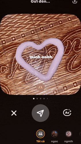 a heart shaped object is being edited on a cell phone