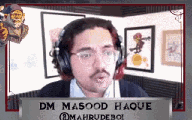 a man wearing headphones has the name dm masood haque on a sign in front of him