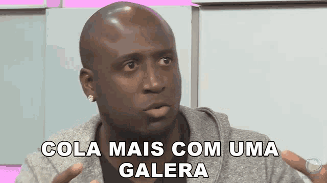 a bald man with the words cola mais com uma galera on his face