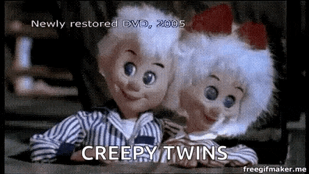 a boy and a girl are sitting next to each other with the words `` creepy twins '' written below them .